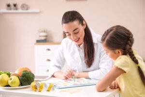 women helping her daughter with math