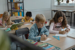 Children studying math in a classroom