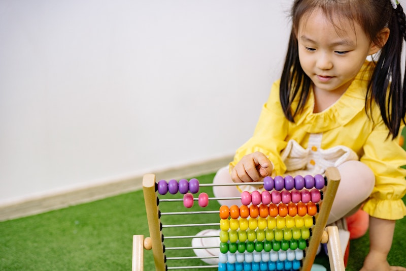 a girl playing skip counting games