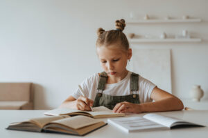 Young girl studying homework