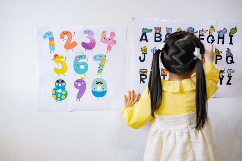 Girl learning the alphabet