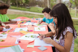 Kidsworking on a project outside
