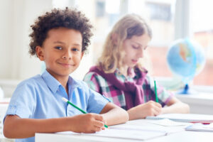 School kids practicing punctuation