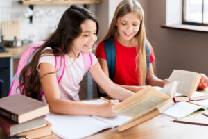 School girls reading books