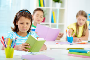 School kids reading books