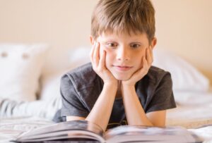 Boy reading book